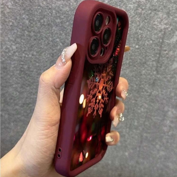Stylish Maroon Phone Case with Snowflake Design compatible with IPhone 14 - Picture 3 of 4